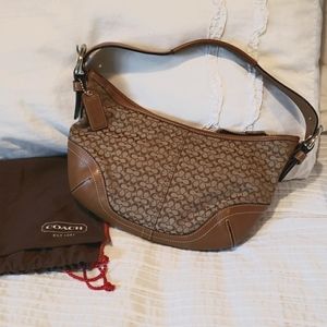 Coach Soho Boho shoulder bag in Signature canvas.